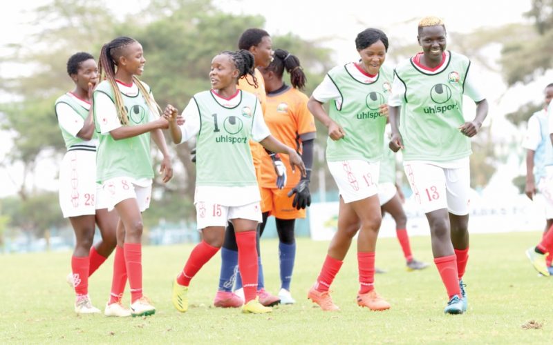 Harambee Starlets players share a light moment during their final training session in Nairobi on Monday. PHOTO/Rodgers Ndegwa