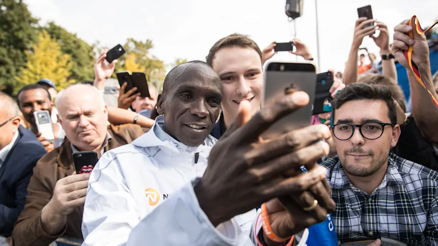 Eliud Kipchoge poses with fans in Berlin. PHOTO/Reuters