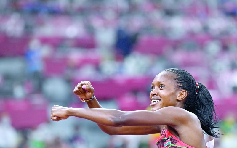 Kenya's Faith Kipyegon celebrates after winning the women's 1500m final during the Tokyo 2020 Olympic Games at the Olympic Stadium in Tokyo on August 6, 2021. PHOTO/AFP