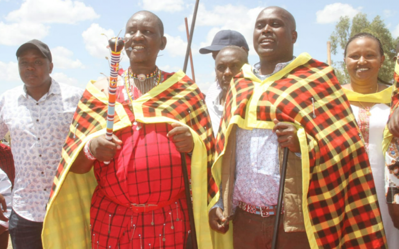 Kajiado local leaders share a light moment during a UDA popularization campaign at Moses Ole Sakuda Kimuka home. PHOTO/Christine Musa