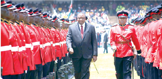 President Uhuru Kenyatta inspects a guard of honour. PHOTO/Print