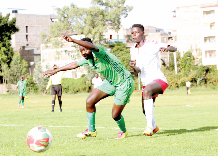 PG 29 Jentrix Shikangwa of Vihiga Queens (L) and Lucy Okoth of Ulinzi Starlet challenge for the ball during their WPL match played at Utalii grounds, Nairobi on December 28 2021.PHOTO RODGERS NDEGWA√