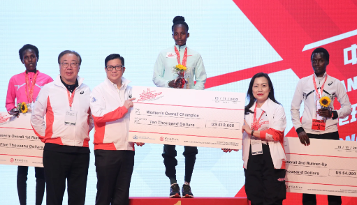 Hong Kong-Zhuhai-Macau Half Marathon women’s winner Sarah Chelangat (centre) on the podium with second-placed Gladys Chepkurui (left) and third-placed Caroline Chepkoech Kipkirui. PHOTO/Xiaomei Chen