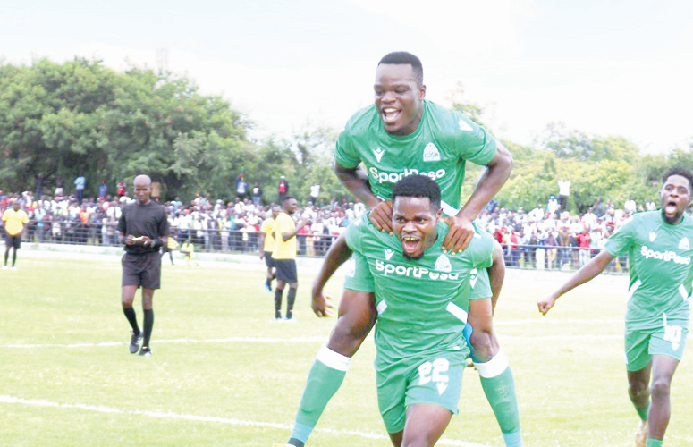 Benson Omalla (front) and Christophe Ochieng (back) celebrate victory at a past FKF-PL match. PHOTO/David Ndolo