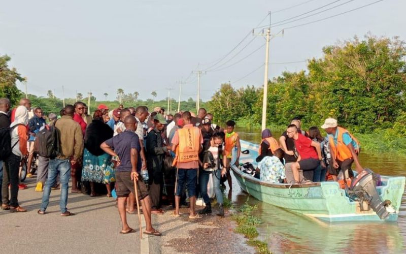 Pedestrian using a boat as Garsen-Witu -Lamu (A7 remains closed. PHOTO/KENHA