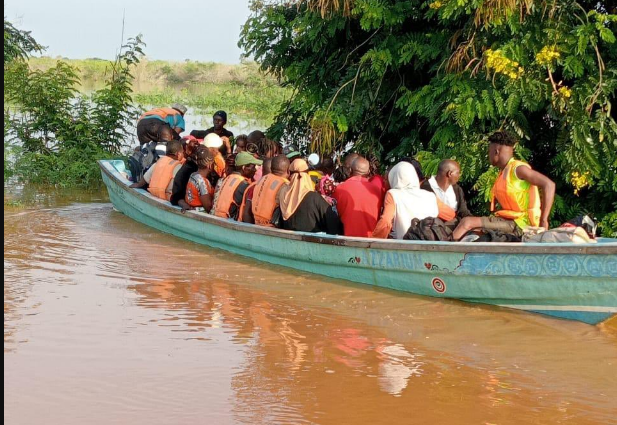 Pedestrian boarding boats as Garsen-Witu -Lamu (A7 remains closed. PHOTO/KENHA