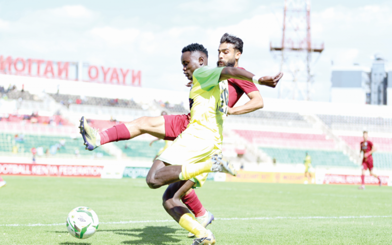 Kakamega Homeboyz winger Hillary Otieno take on Al Hilal defender Bashier Alkarami in a CAF Continental match in April. This weekend Homeboyz face AFC Leopards. PHOTO/David Ndolo