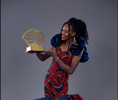 Faith Kipyegon poses with her Women's World Athlete of the Year Award. PHOTO/World Athletics