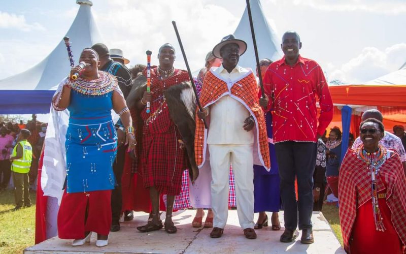 Opposition leader Raila Odinga joins Kajiado East MP Kakuta Maimai and governor Joseph Ole Lenku for a Maasai jig at Merrueshi village. PHOTO/Christine Musa