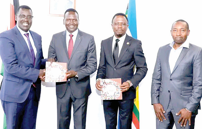 Sports CS Ababu Namwamba (second right) with PS Peter Tum (left) join Nock president Paul Tergat (centre) and Secretary General Francis Mutuku in marking 200 days to Paris Olympics at a function in Nairobi on Monday. PHOTO/David Ndolo