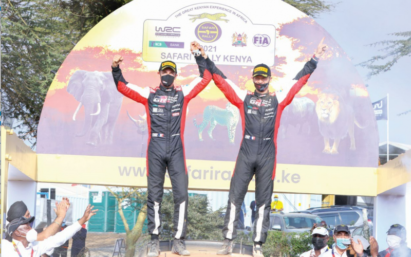 Sebastien Ogier (right) with his navigator celebrate after winning the 2021 WRC Safari Rally in Naivasha. PHOTO/Philip Kamakya