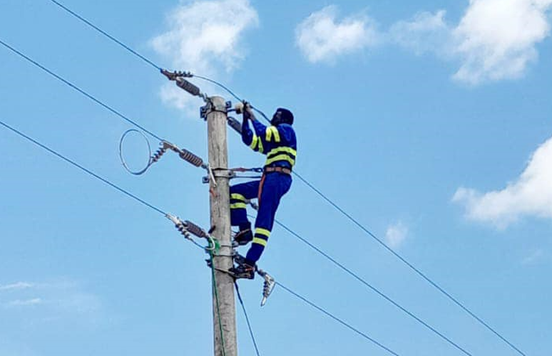 Kenya Power technician at work