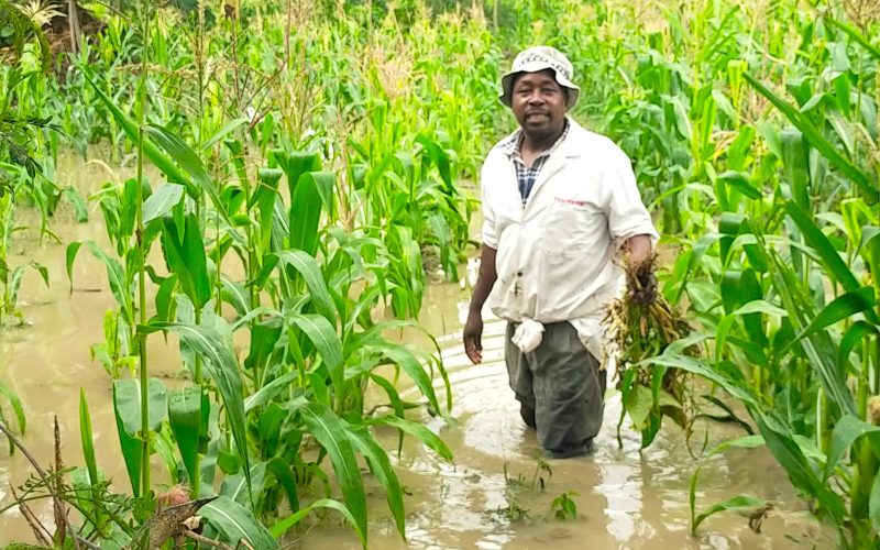 Michael Muya a resident of Noonkopir Kitengela, in his flooded farm. PHOTO/Christine Musa