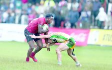 Friday, January 12, 2024 - Issue No. 07974 John Okoth (left) wards off a tackle attempt by a Samurai player during Safari 7s Cup final at the RFUEA ground in November last year. PHOTO/Alex Njue