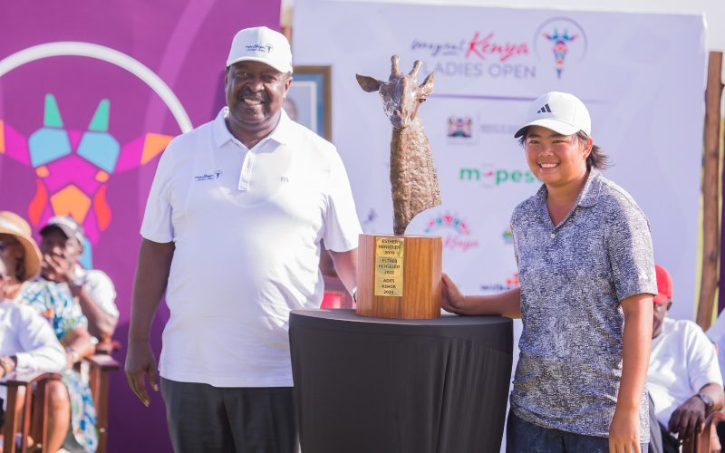 Prime Cabinet Secretary Musalia Mudavadi presents the winner's trophy to Shannon Tan after clinching the 2024 Magical Kenya Ladies Open in Vipingo. PHOTO/Tristan Jones