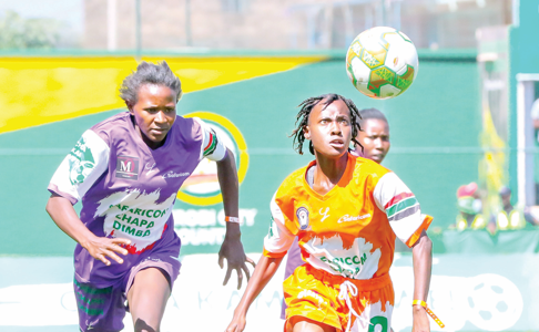 Patience Kasichana of Dagoretti Mixed Girls (right) in action during their Safaricom Chapa Dimba Nairobi regional final match against Misericordiae Queens at Dandora Stadium. PHOTO/David Ndolo