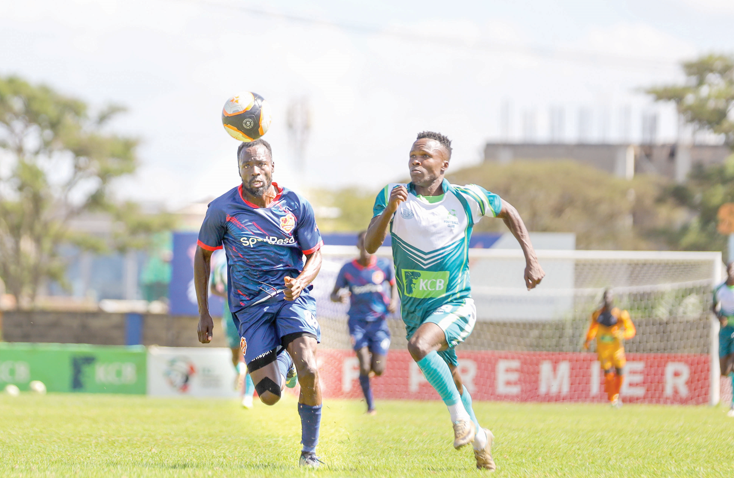 KCB’s Stephen Etyang (right) vies for the ball against his opponent during their Kenya Premier League match against Murang’a Seal at the Police Sacco Stadium on March 3, 2024. PHOTO/Rodgers Ndegwa