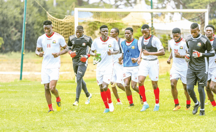 Harambee Stars players jog during training at the Kasarani Annex on Tuesday morning.