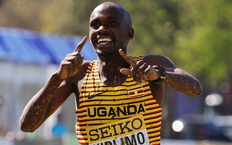 Jacob Kiplimo celebrates his senior title win at the World Athletics Cross Country Championships in Belgrade.