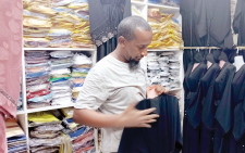 Sayyed Ahmed Bakar Hajji, a businessman at MacKinnon Market who sells Kanzu, Hijab and Niqab says business is booming after a lull.