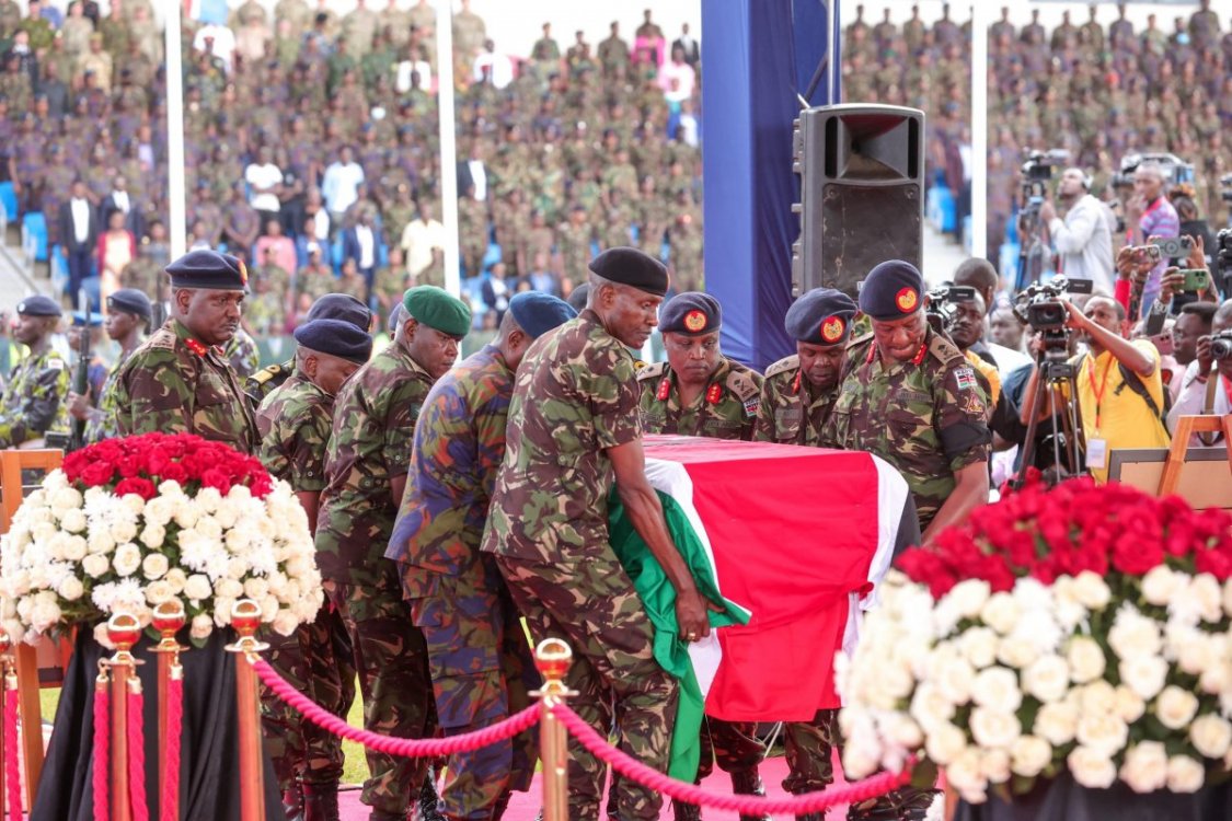 Members of the Kenya Defence Forces carry the casket bearing the body of CDF General Ogolla at Ulinzi Sports Complex in Lang'ata. PHOTO/(@HonAdenDuale)/X