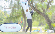 Golfer Jared Omondi follows his tee-shot during the second leg of the 2024 NCBA Golf Series held at Nakuru Golf Club.