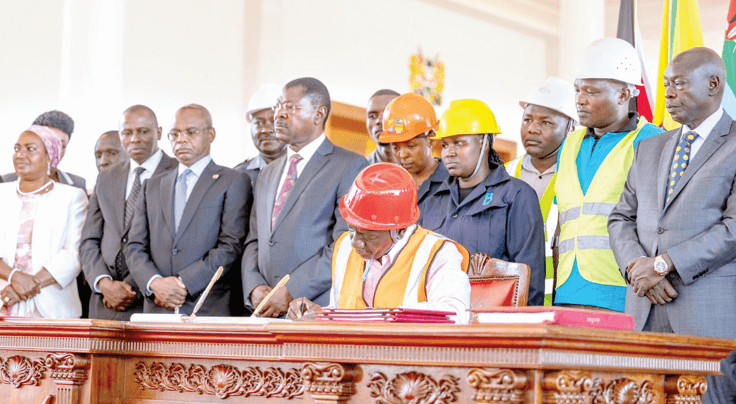 President Ruto signs the Affordable Housing Bill into law on March 19, at State House, Nairobi. PHOTO/PCS