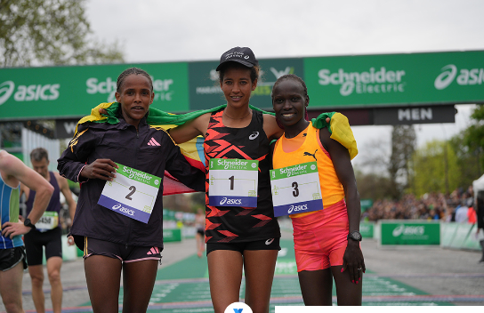 Mestawut Fikir, Enatnesh Alamrew Tirusew, and Vivian Cheruiyot on the podium at Paris Marathon. PHOTO/(@parismarathon)/X