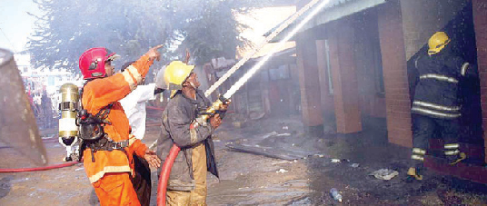 Firefighters at work. Research suggests the hero label on such workers is loaded with unhelpful assumptions about their personal needs and ambitions. PHOTO/Print