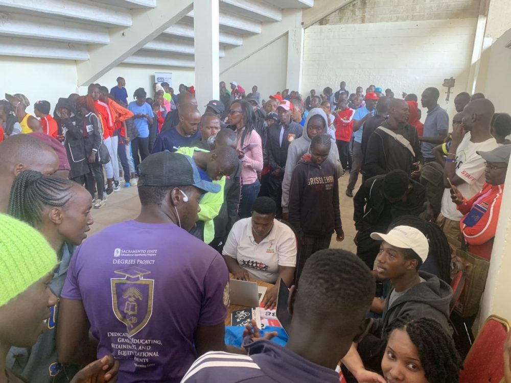 Athletes lines up to collect their race bibs ahead of the AK National trials PHOTO/Athletics Kenya@athletics_kenya/X