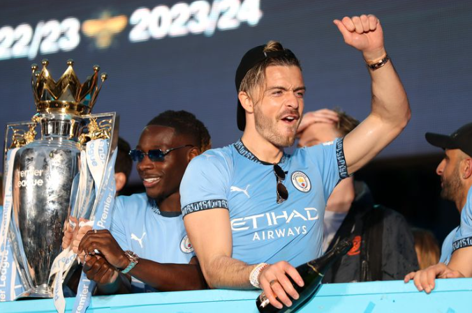 Jack Grealish nearly falls off bus in Manchester City trophy parade