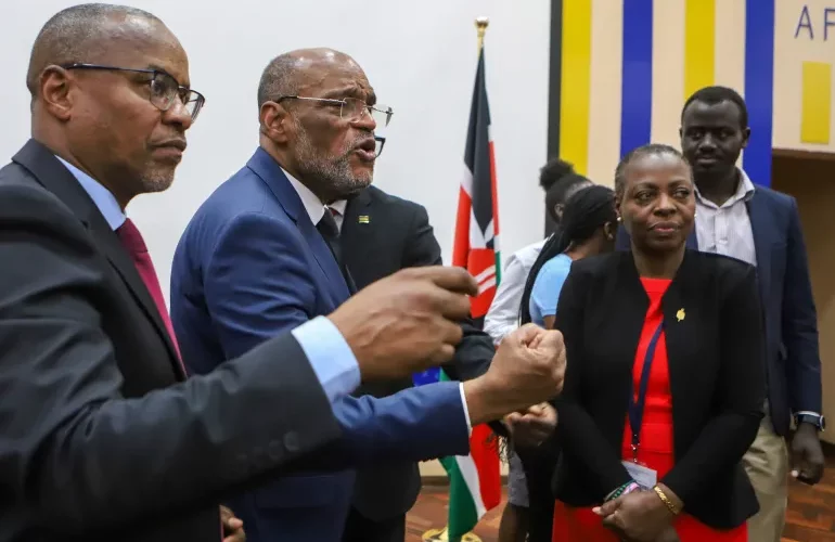 Former Haitian Prime Minister Ariel Henry, second from left, after giving a lecture at United States International University in Nairobi, Kenya, on March 1, 2024.