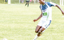 KCB’s James Mazembe in action against Nzoia Sugar at the weekend. PHOTO/KCB