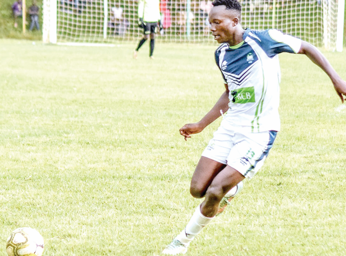 KCB’s James Mazembe in action against Nzoia Sugar at the weekend. PHOTO/KCB