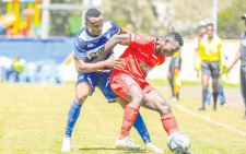 AFC Leopards’ Clifton Miheso (left) tackles Baraka Badi of Kenya Police FC during their MozzartBet Cup match in Nairobi yesterday.