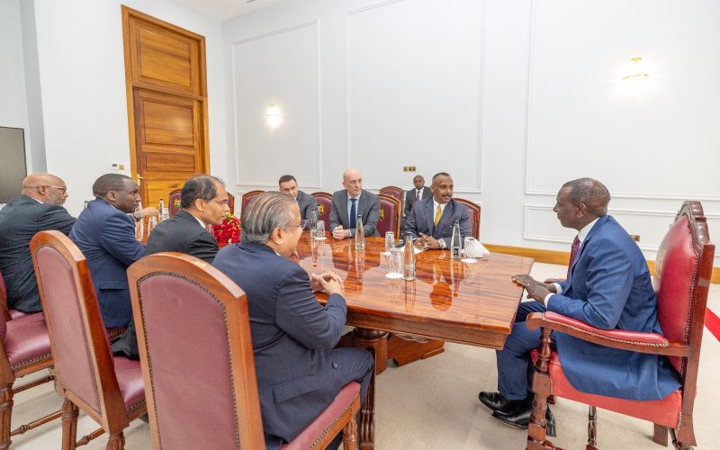 President William Ruto with officials from the two tea companies