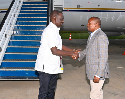 CS Kithure Kindiki receiving President William Ruto at the Jomo Kenyatta International Airport (JKIA). PHOTO/@WilliamsRuto/X