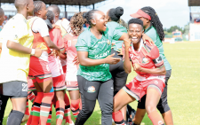 Junior Starlets captain Elizabeth Ochaka (right) celebrates with other members of the team after beating Ethiopia to progress in the World Cup qualifiers. PHOTO/David Ndolo