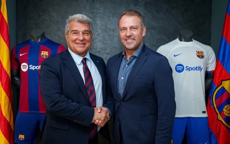 Hansi Flick is welcomed by Barcelona President Joan Laporta. PHOTO/fcBarcelona.com