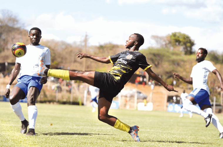Eric Balecho of Muranga Seals (C) clears the ball under pressure from Stephen Okolla and Khalid Jumaan of Sofapaka during their FKF-PL match staged at St Sebastian Stadium, Muranga on October 7, 2023. PHOTO/Rodgers Ndegwa