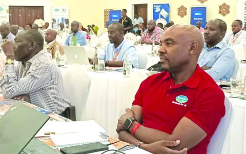 Brookside’s general manager for Sales Joseph Muguongo (right) at yesterday’s hoteliers symposium in Diani, Kwale county.