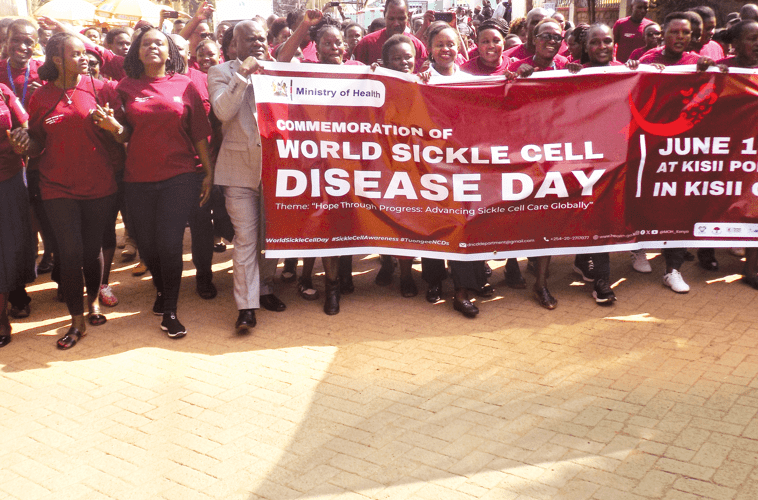 Residents march in Kisii town to mark World Sickle Cell Day celebration held at Kisii National Polytechnic on Wednesday, June 19. PHOTO/Robert Ochoro