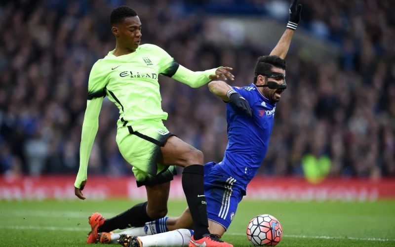 Tosin Adarabioyo challenges Fabregas in a past match against Chelsea. PHOTO/@CFCBlues_com/X