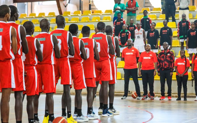 The Kenya U18 boys side sing the national anthem before their game against Rwanda. PHOTO/@FubaBasketball/X