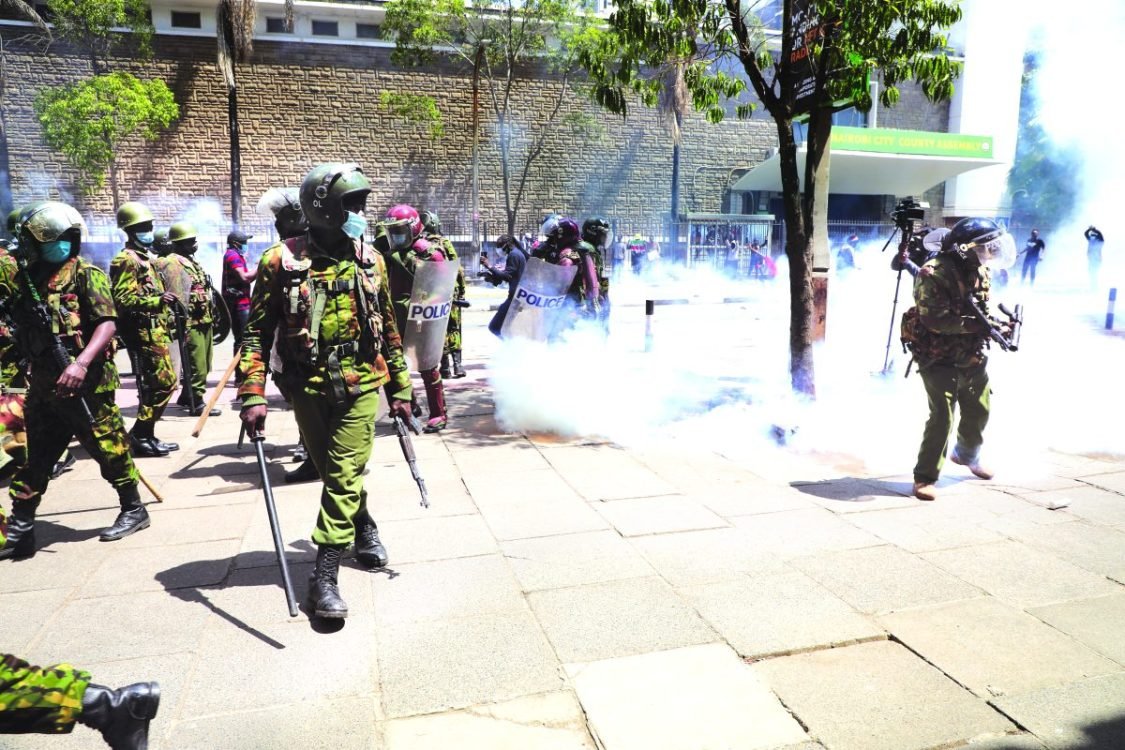 Kenyan police keeping calm during protests. PHOTO/Print