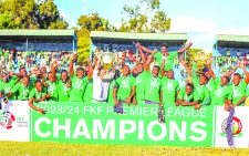 Gor Mahia team celebrate after being crowned FKF-PL winners in the 2023/24 season at the Machakos Stadium. PHOTO/Print