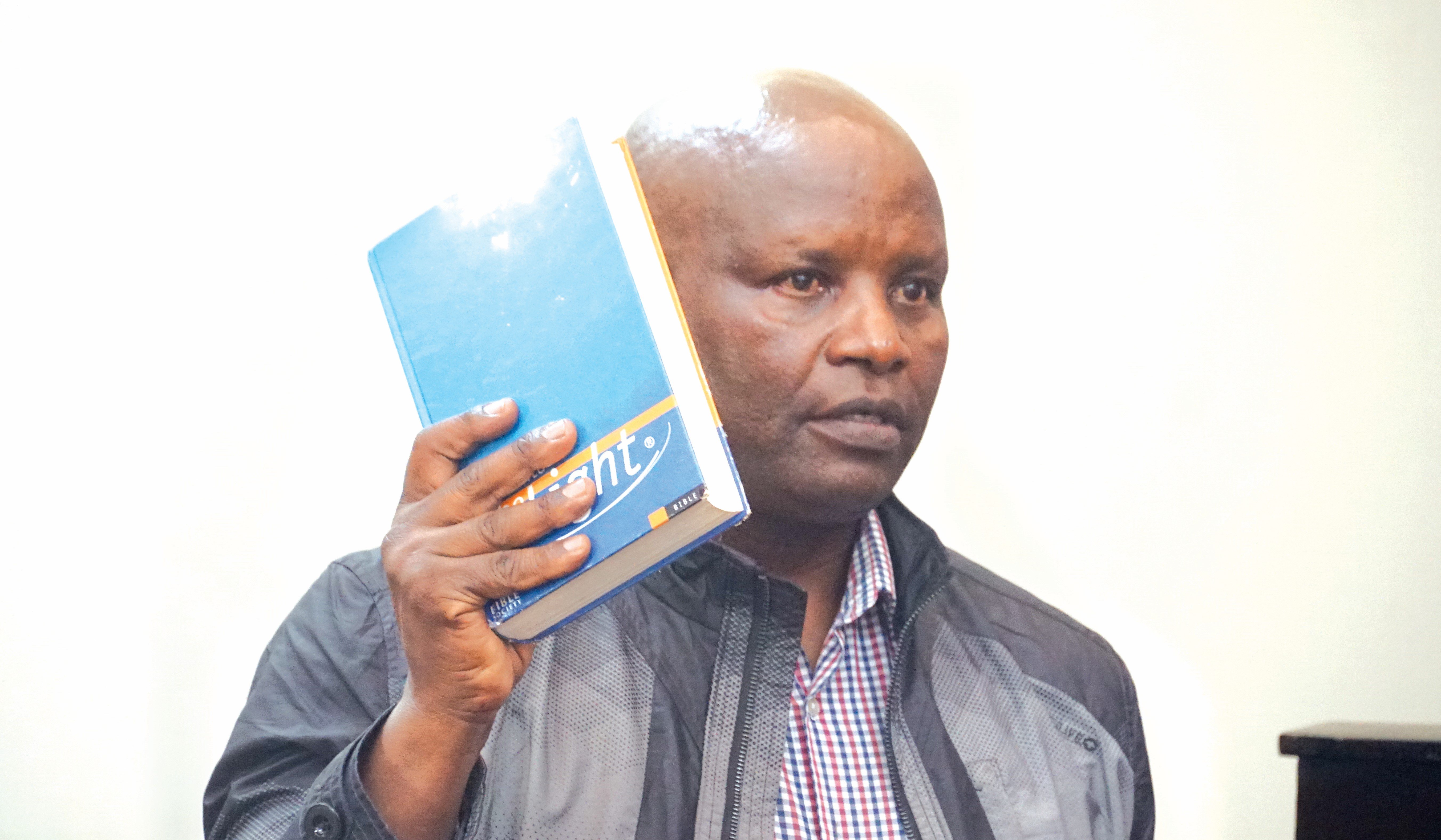 Jonah Rutto 52, in the dock at Eldoret High Court during the succession hearing where he is battling his biological father over the inheritance of the latter’s deceased father Mzee Kireger Kutto’s multi-million shillings estate in Uasin Gishu County. PD/winstone chiseremi