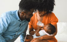 Parents feeding feeding their child with a bottle. Image used for representation purposes. PHOTO/Pexels