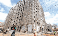 Workers at the site of the ongoing affordable housing project in Mukuru, Nairobi. PHOTO/Print