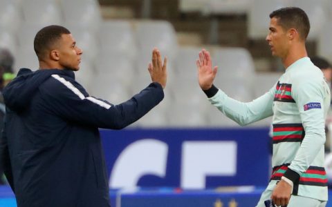 Cristiano Ronaldo and Kylian Mbappe greet each other at a past match. PHOTO/@itvfootball/X